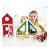 Hape Houten Speelgoed Boerderij 1 Hape Houten Speelgoed Boerderij -Speelgoedwinkel e3015 barn play wtih child 2 kopie